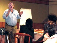 Tog speaking at the Main Event